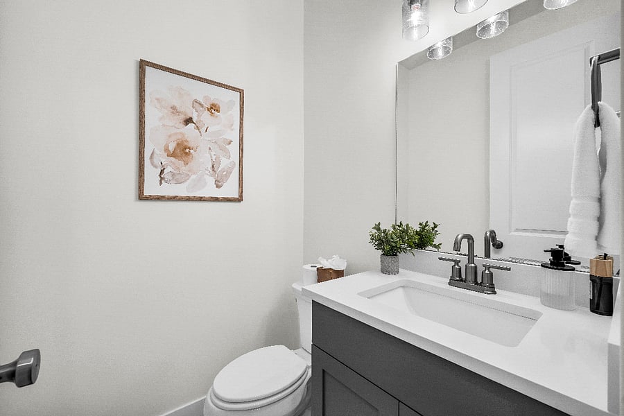 Half bathroom on the main floor near the laundry room and garage entrance.