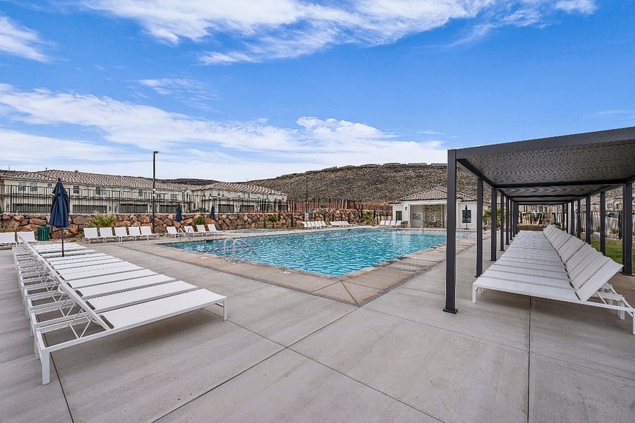 Pool area lounge chairs and cabanas.