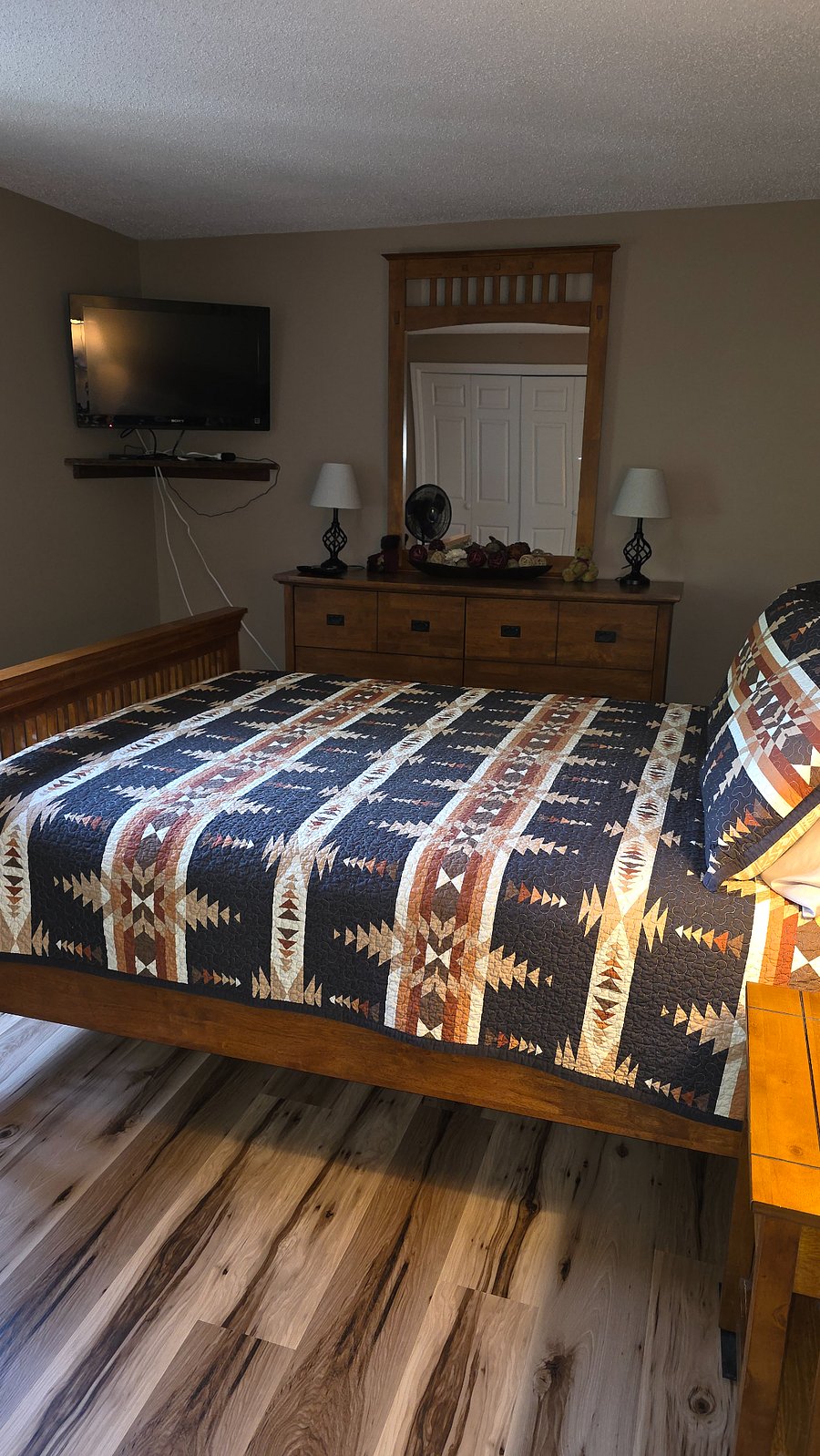 Upstairs bedroom with a queen bed
