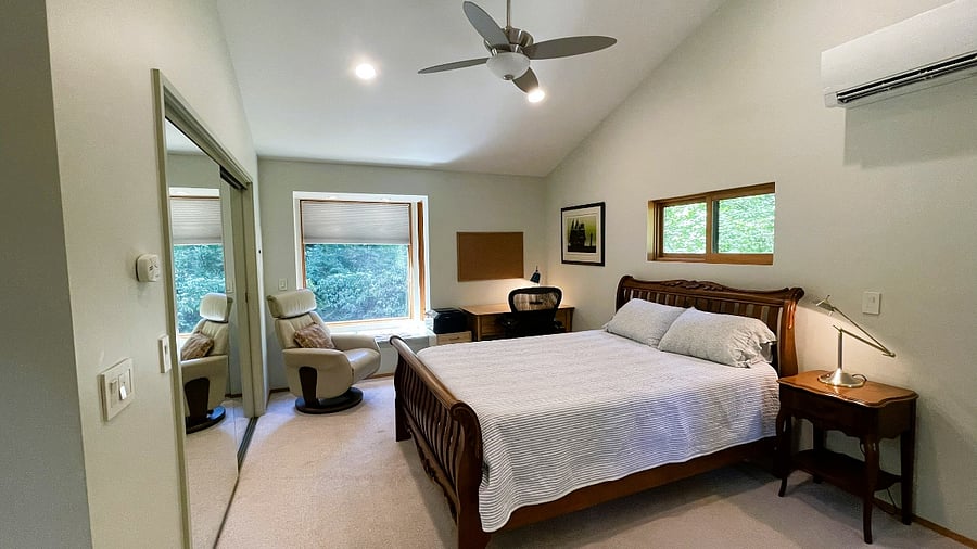 bedroom, looking across to window seat & office area