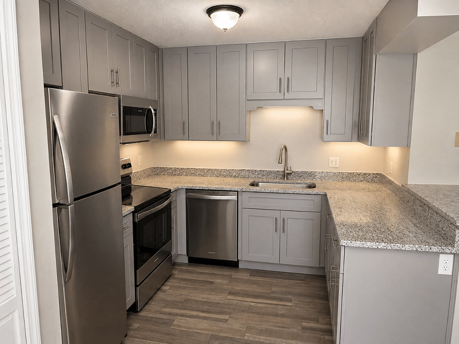 Photos are actual except for under cabinet lighting. There is a light over the sink. Microwave and dishwasher have been virtually staged to illustrate the planned furnishings and finished appearance of the rental. Actual appliance, finishes may vary.