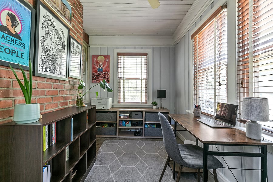 The first floor also features a lovely sunroom that is ideal for a home office space or playroom.