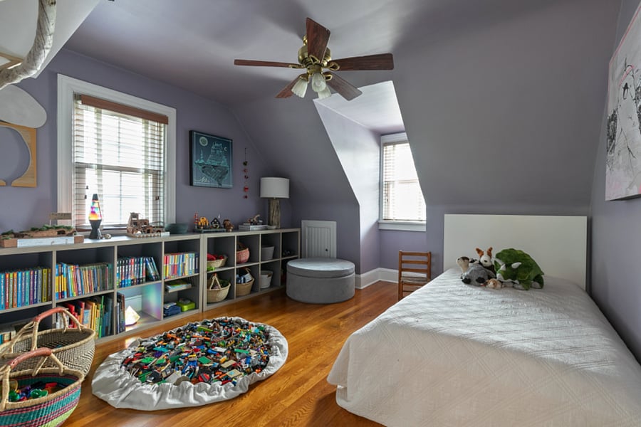 This bedroom can easily serve as a kids room or space for a visiting guest.