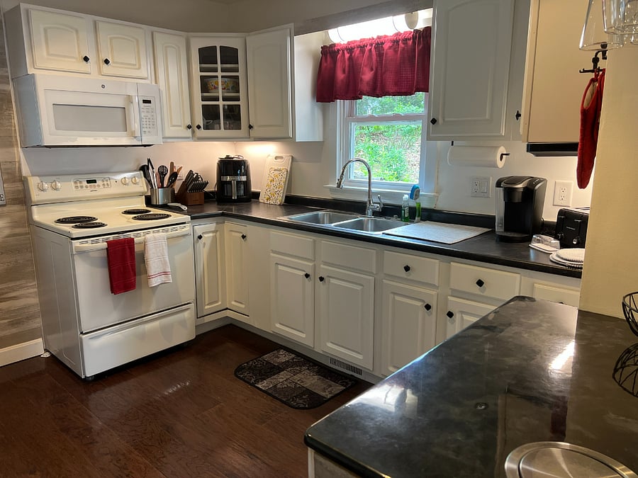 Dishes, mixing bowls, pots, and pans, utensils, and small appliances provided.