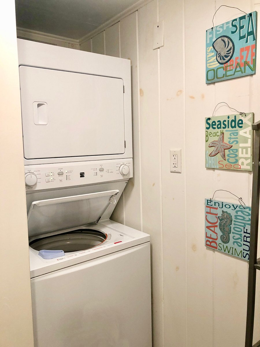 Stacked washer and dryer also in bathroom