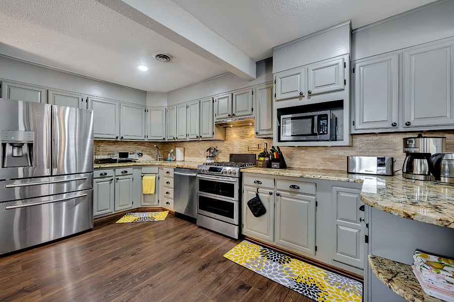 Stainless appliances, double oven, microwave, coffee machine, dishwasher, fridge/freezer.