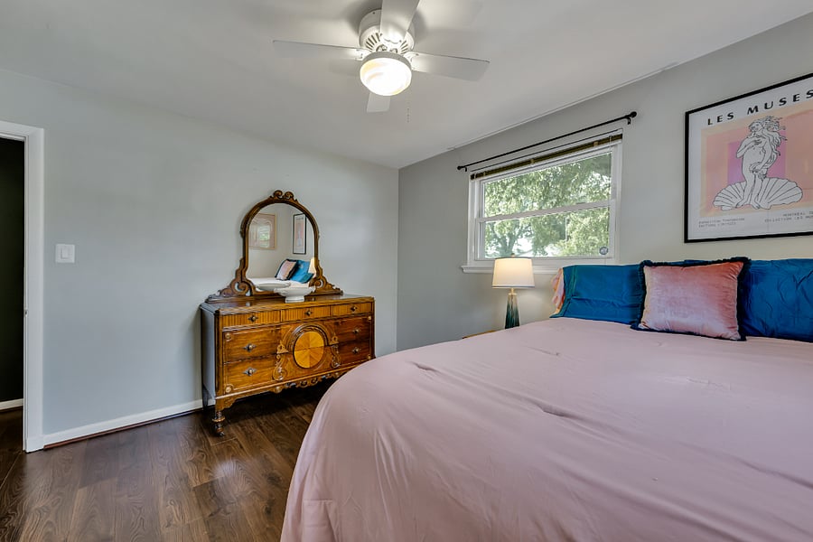 Queen bedroom with quality furnishings.