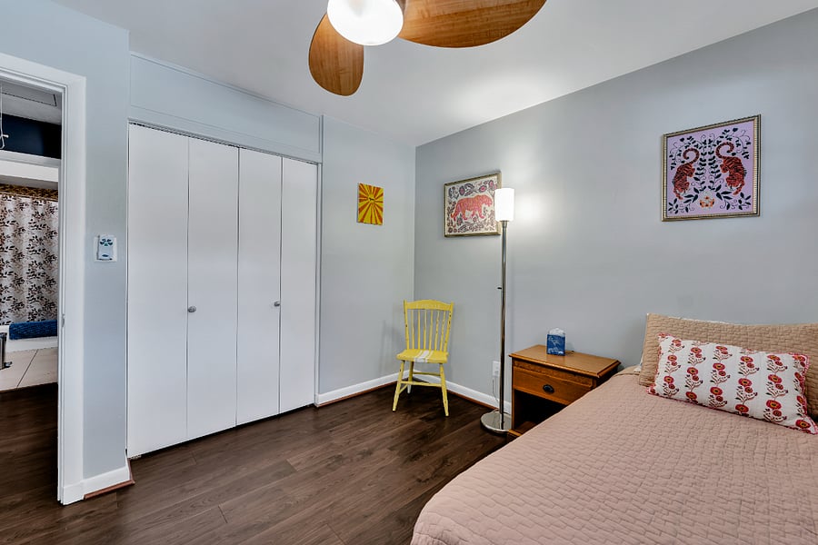 Twin bedroom with sitting area.
