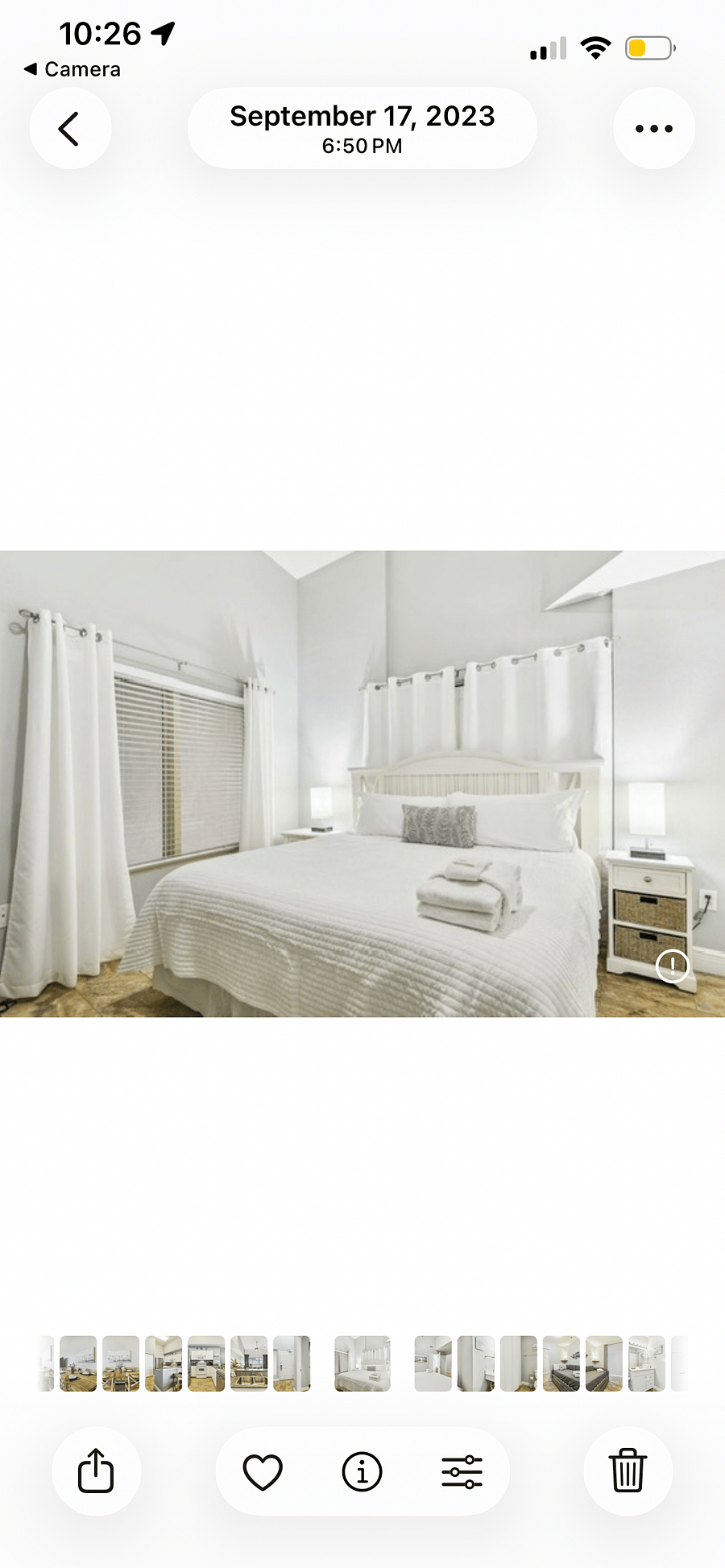 Primary bedroom with blackout curtains