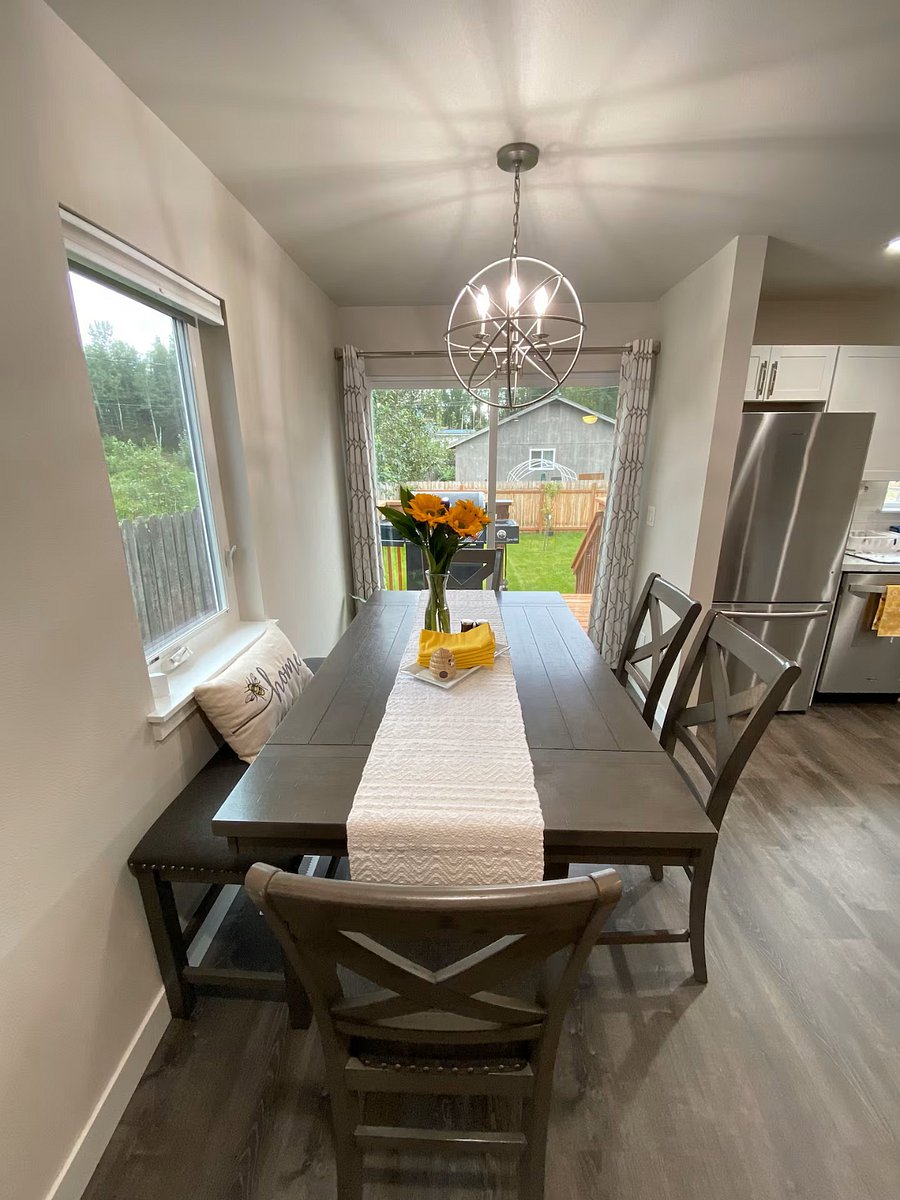 Dining table has leaves that can be added for additional space