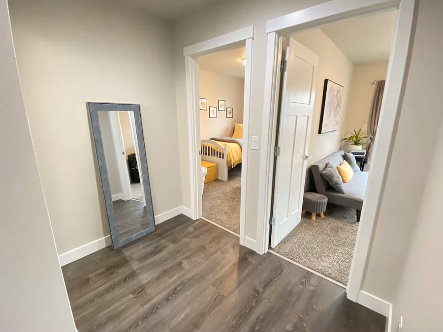 Area leading to office space, twin bedroom and associated restroom.