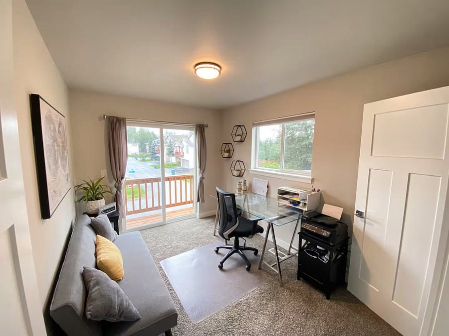 A truly dedicated office for our remote-working guests or school-aged kids. Includes a printer, shredder, extra chargers, pens, pencils, highlighters, notebooks, sticky notes and general office supplies. A small deck is accessible from this room.