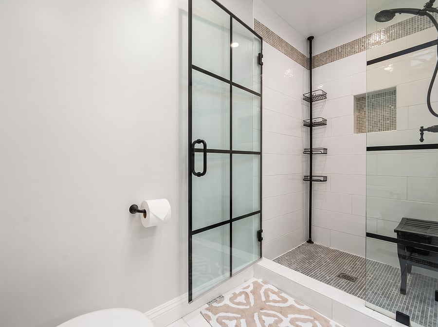 Master En-Suite Bathroom
Spa-vibes at home! Unwind in this sleek 2nd-floor master bath featuring a black grid walk-in shower, pristine double vanity, soft ambient lighting, and high-end tile finishes. Pure luxury for your stay.