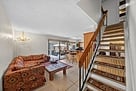 Kitchen couch and open staircase