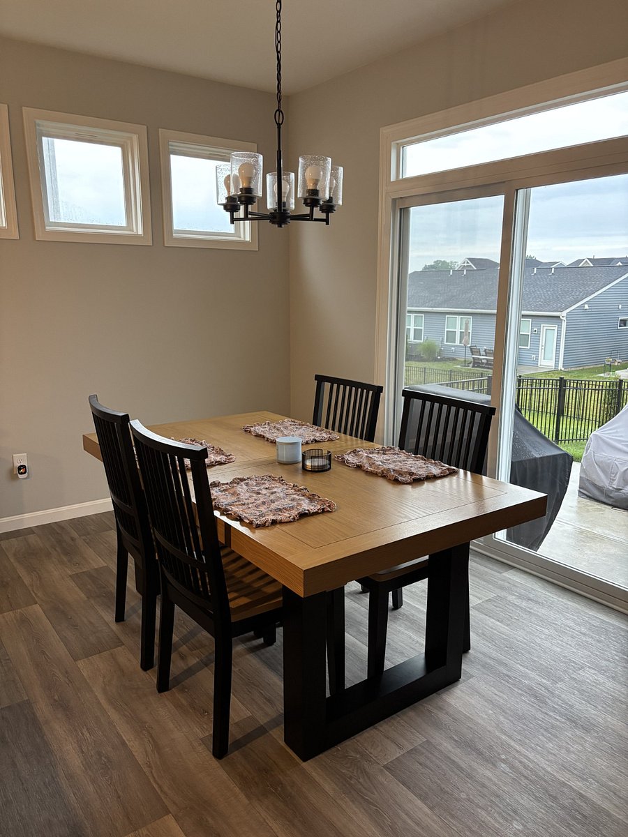Kitchen table. Two additional chairs in storage if needed.