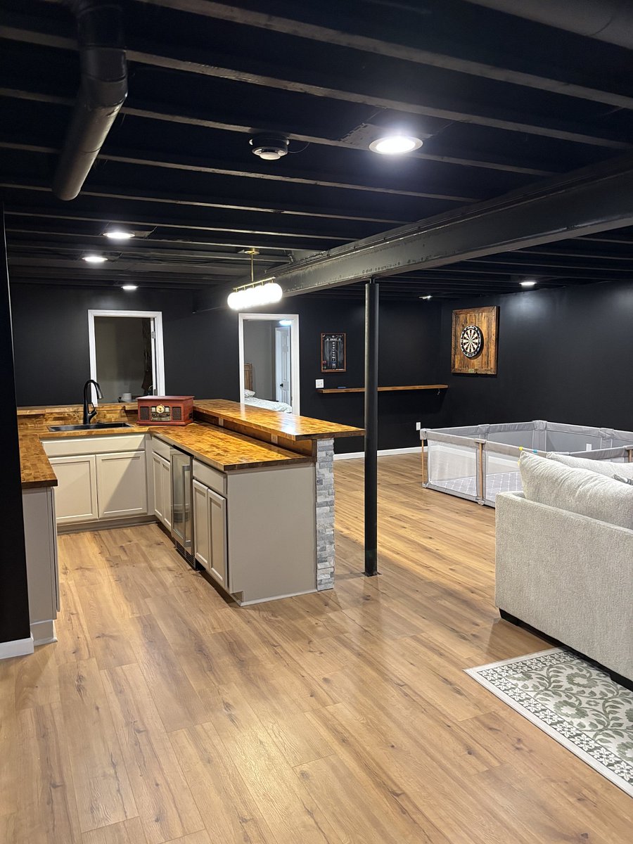 Finished basement - Sink in bar, darts, playpen for kids. Can be left out or stored for your stay.