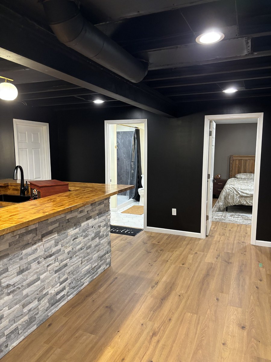 Finished basement - Entry to storage/utilities, 3rd full bath and dedicated office space.
