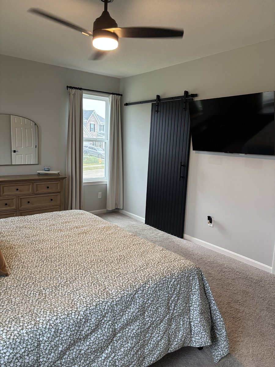 Master bedroom, entry to attached full bath.