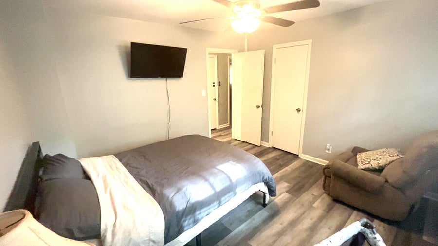  Bedroom 4 private unit with tv dresser and lounging chair