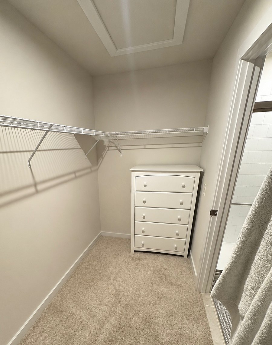 Master Bedroom Walk-in Closet with Dresser