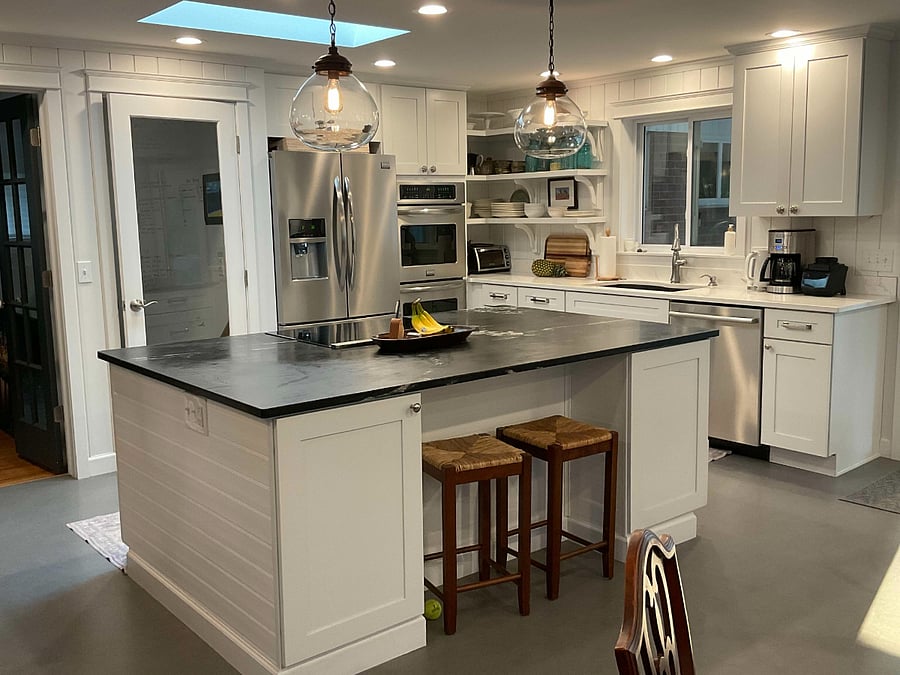 Upon entry from garageShared- Main Kitchen. Glass door leads to basement.