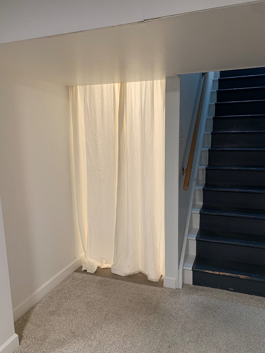 Curtain providing privacy between rental space and shared workout space.