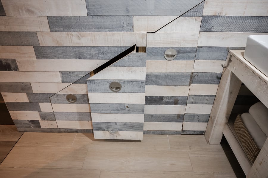 Additional storage under stairs.