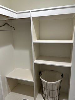 Main bedroom closet. Enough storage a couple.