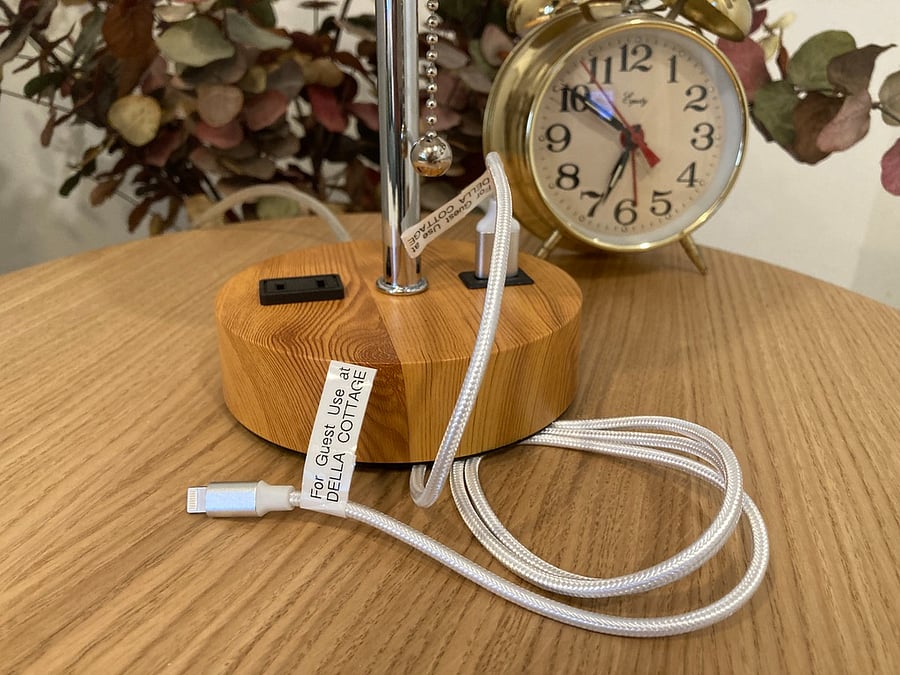 We provide phone charging stations on both sides of the bed, and there is a USB power outlet on the counter.