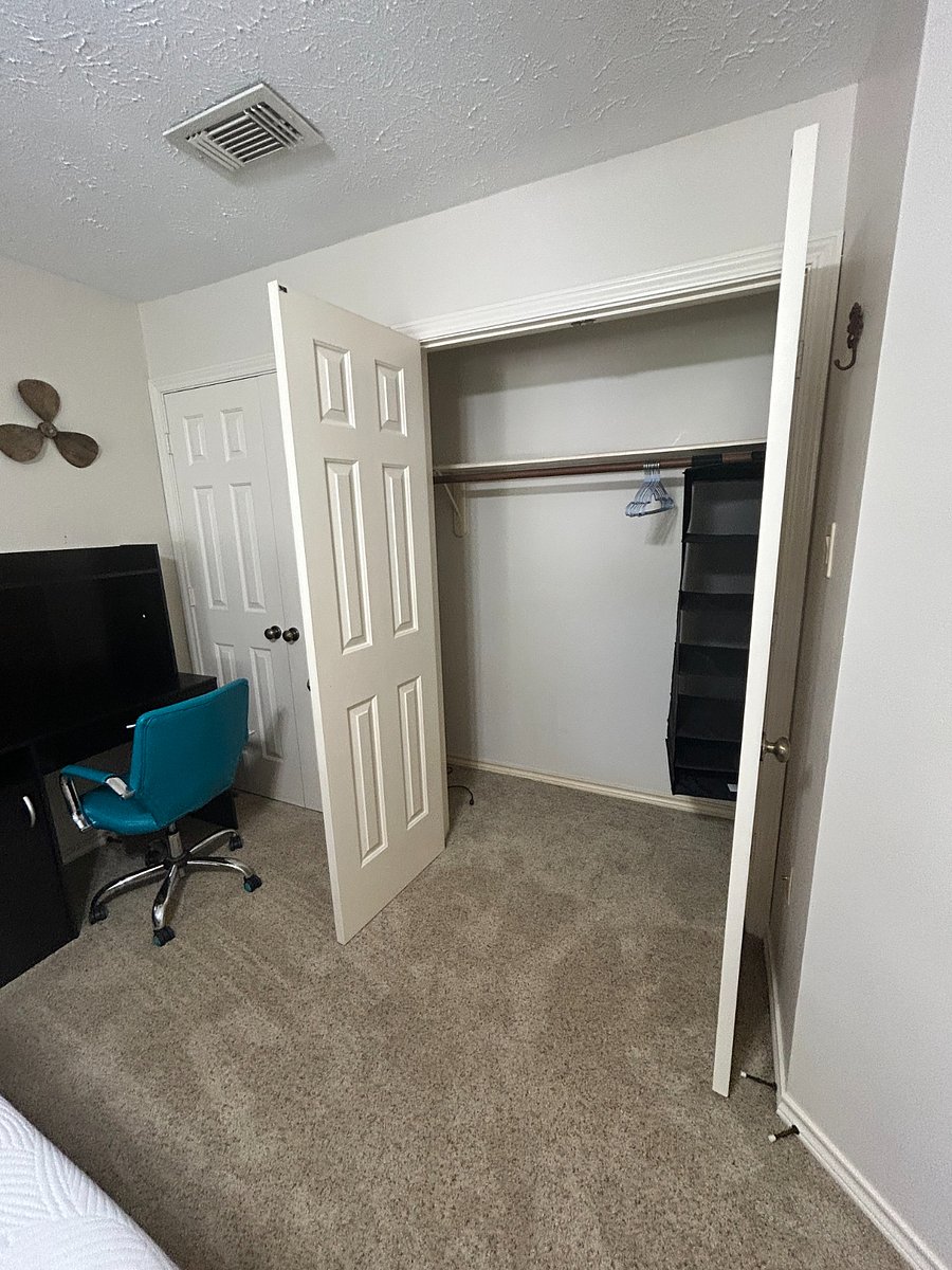 Ample double closet storage with hanging cubby and hanger starter pack.