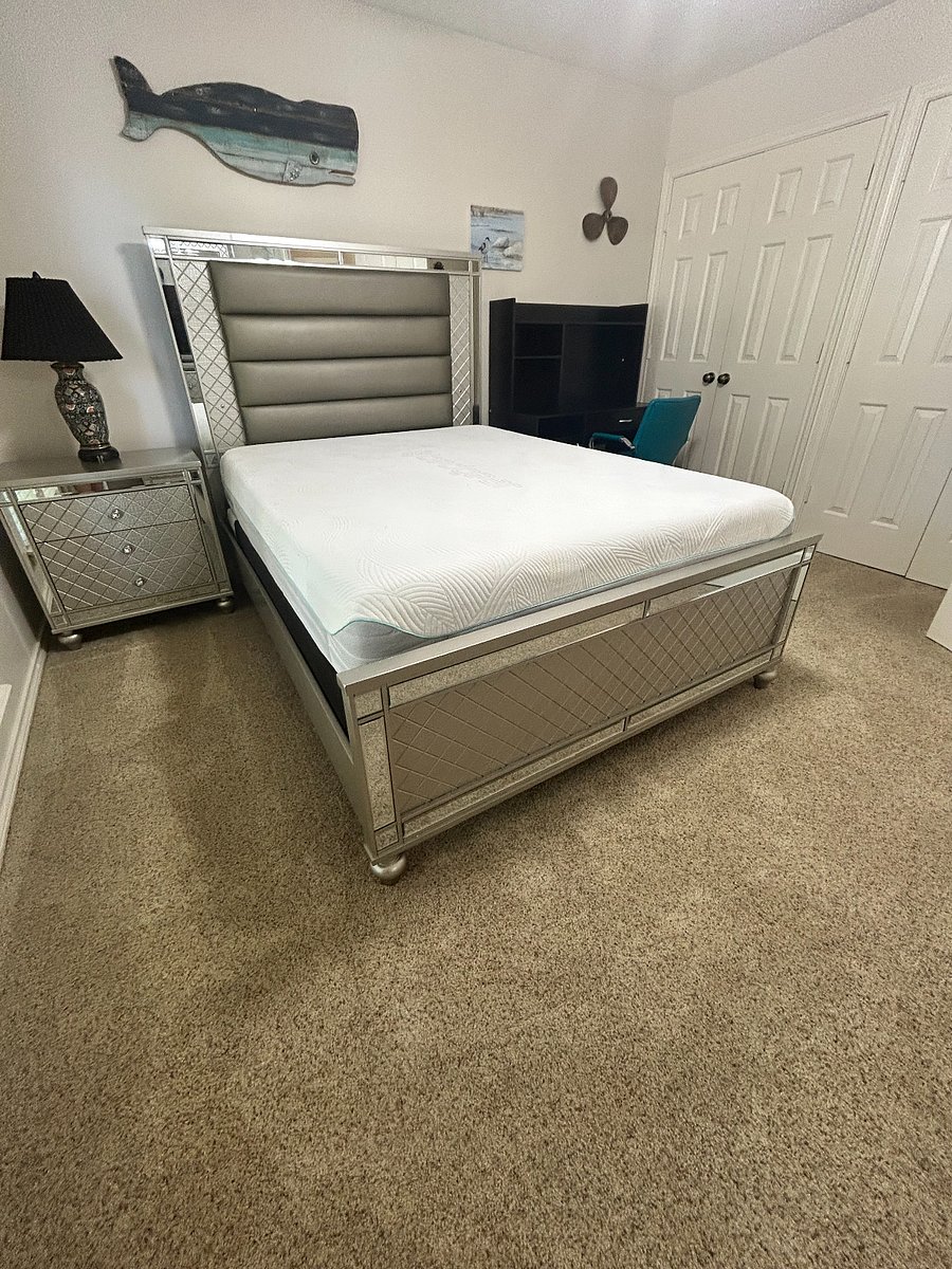 Available Bedroom. Headboard and dresser are backlit.