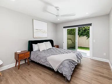 guest bedroom 1 - queen bed, outdoor access