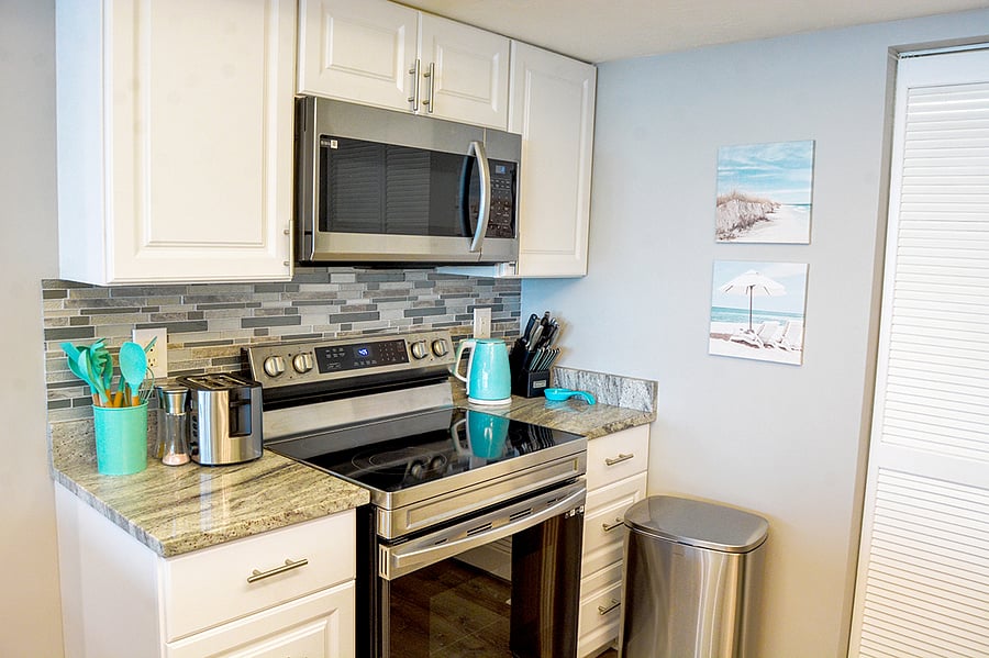 Full size kitchen with updated appliances.