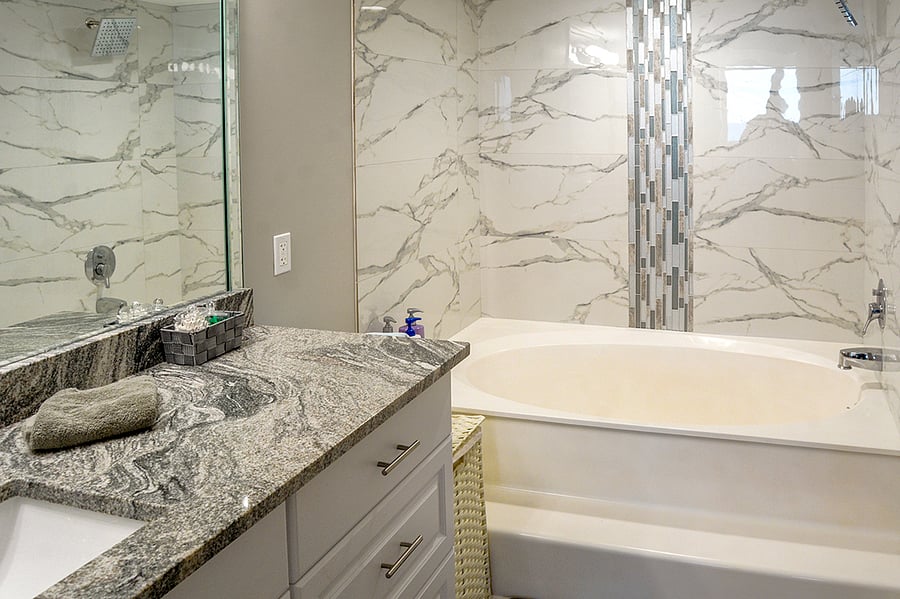 Master bath with luxurious step up bath for two.