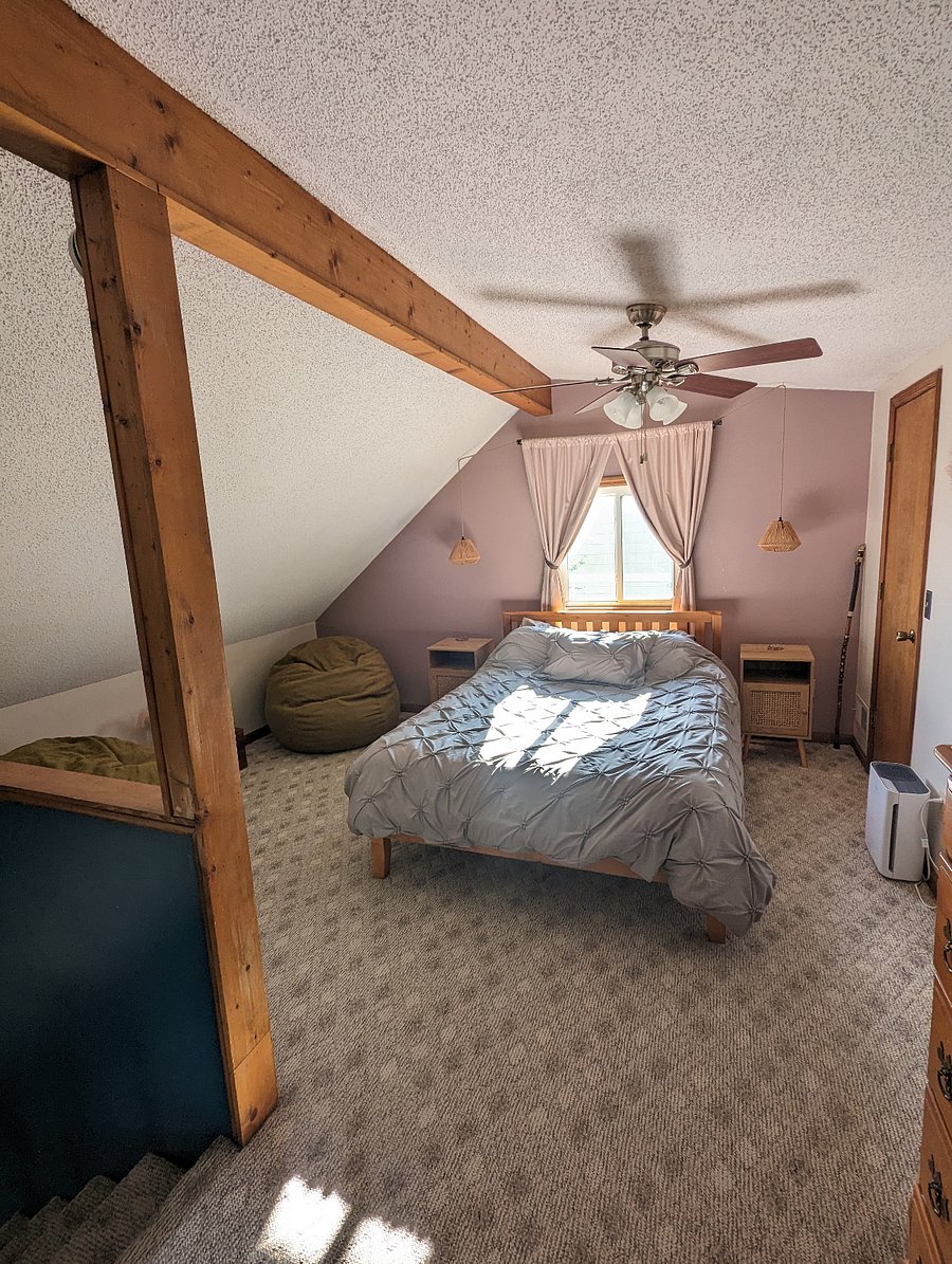 Upstairs loft bedroom with queen bed