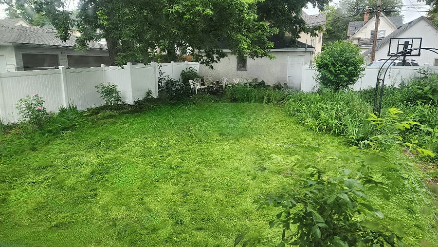 Private fenced backyard with room to relax, play, or enjoy time outdoors.