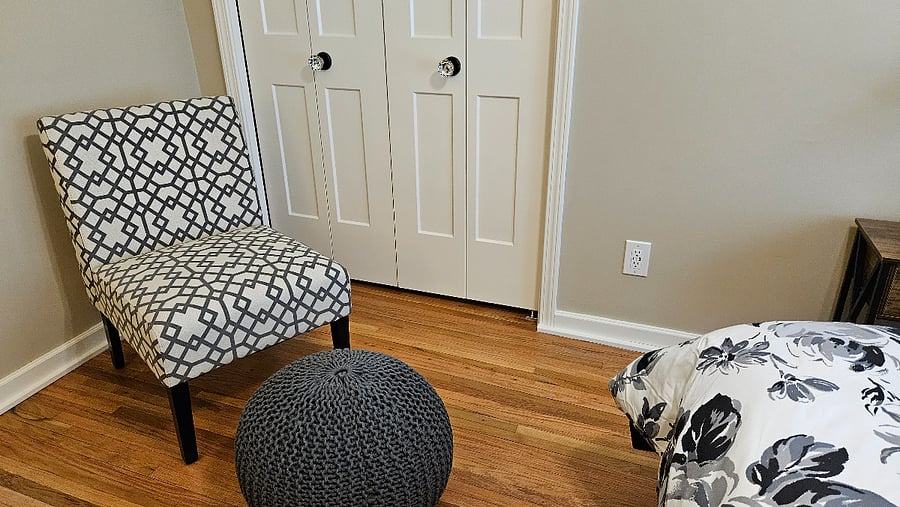 Double closet and additional seating provide plenty of space to settle in.