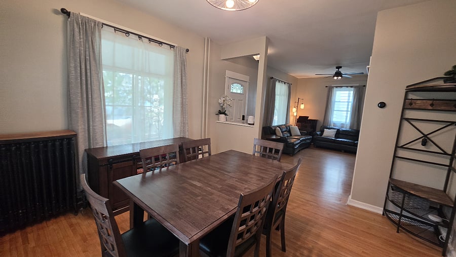 Expandable dining table seats up to 10, making room for shared meals, work, games, or time together.