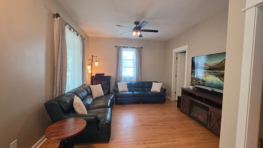 Settle into the living room for a movie, conversation, or a quiet evening, with plenty of seating and the Samsung Frame TV.