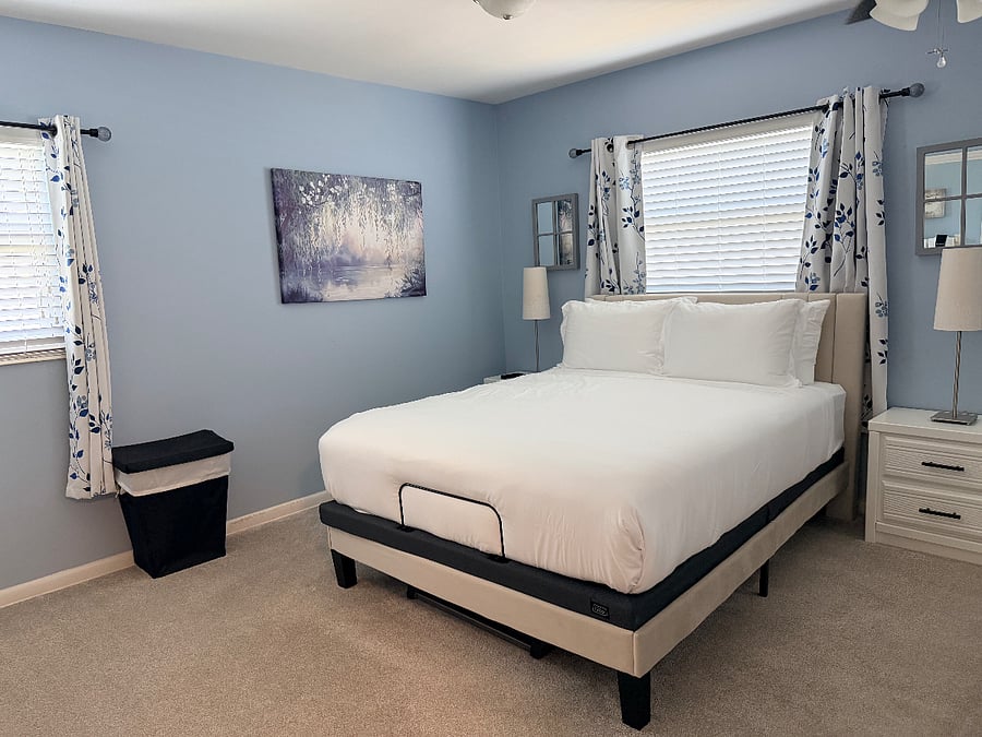 Primary bedroom with queen sized bed