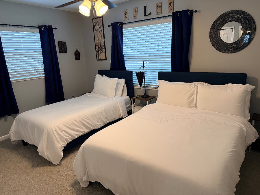 Secondary bedroom with Full-sized and twin-sized memory foam beds.