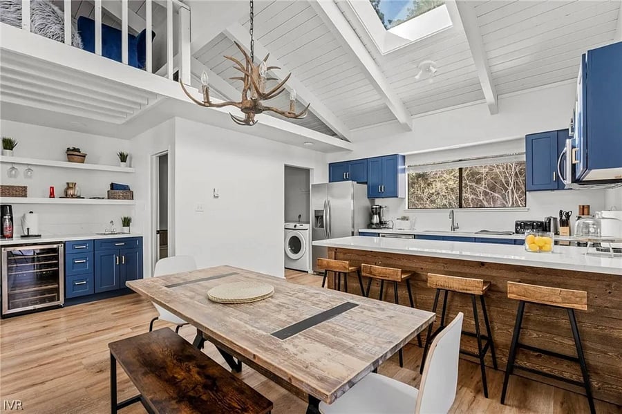 Reclaimed wood dining table has two benches and two chairs (seats 6-8).Primary bedroom has king memory foam mattress and private en suite bathroom.