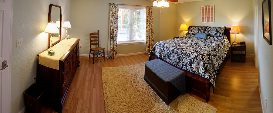 Primary bedroom with king sized bed