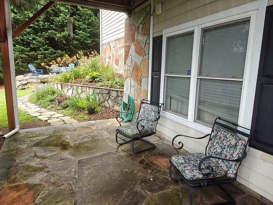 Patio to the primary room with access to the firepit