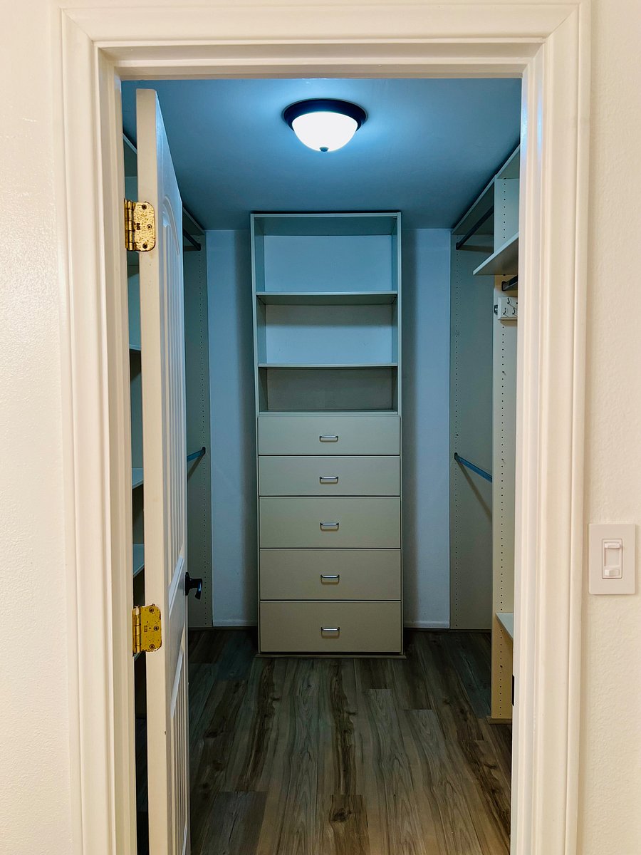 Primary bedroom walk-in closet