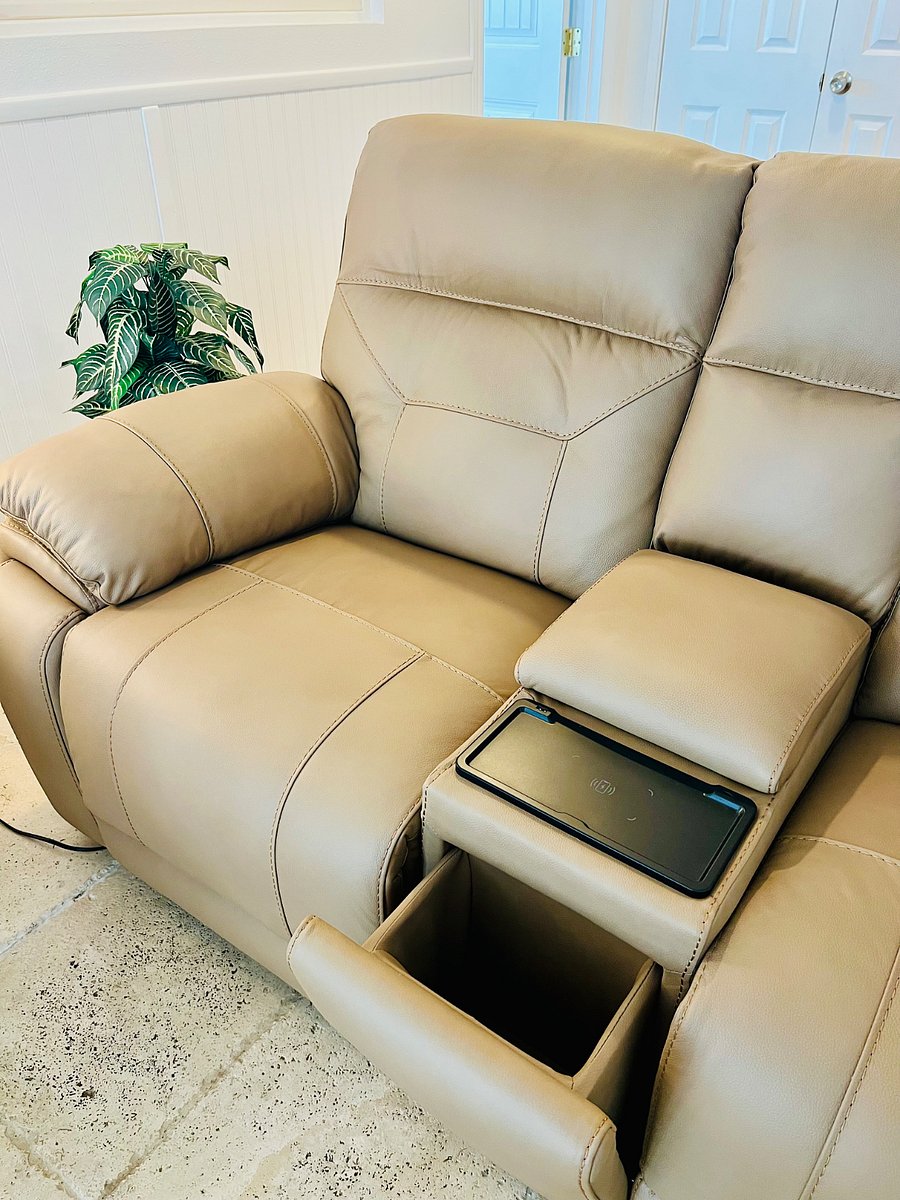 The furniture is all brand new and has smart features such as charging pads and ports.