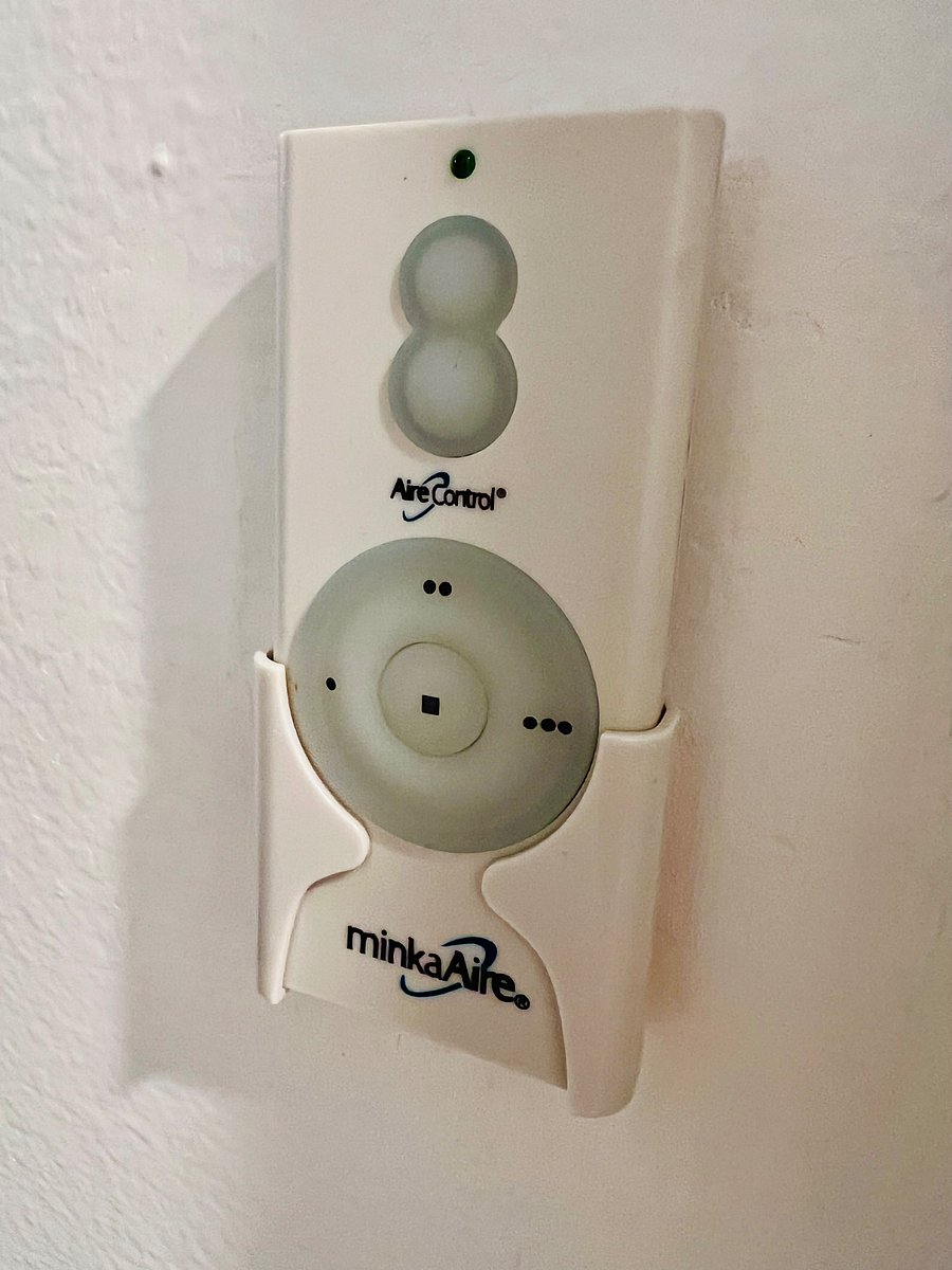 This is the control for the primary bedroom ceiling fan/light. The kitchen ceiling fan/light has the same type of control