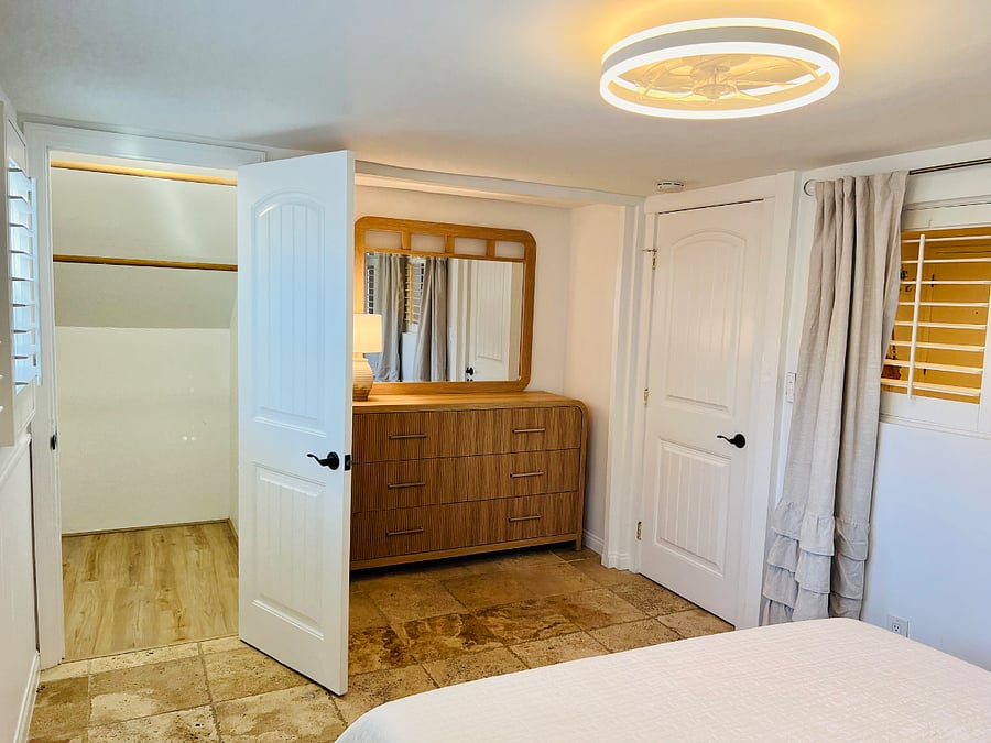 View of walk-in closet of the guest bedroom