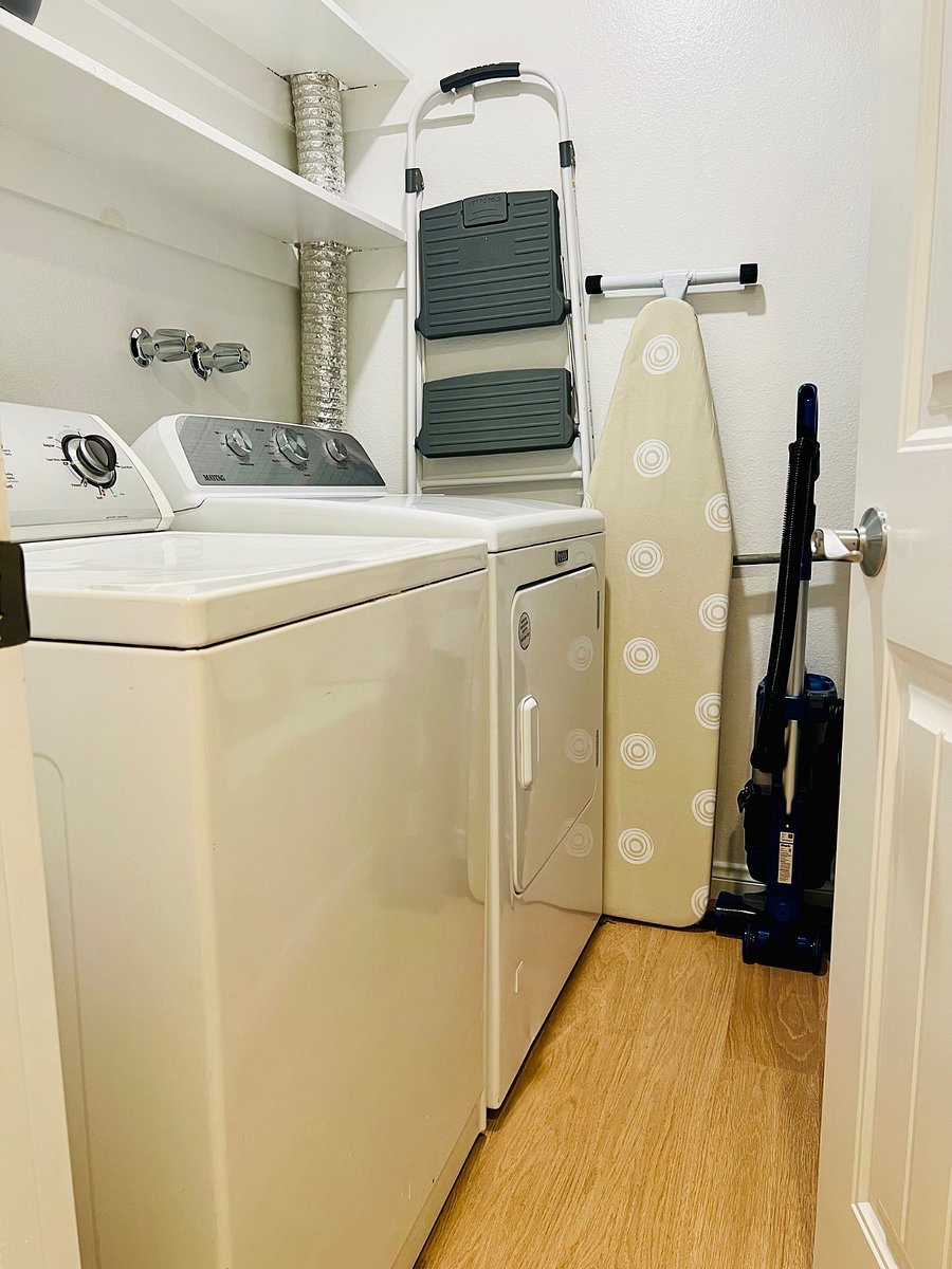 Full sized washer/dryer, ironing board/iron and vacuum
