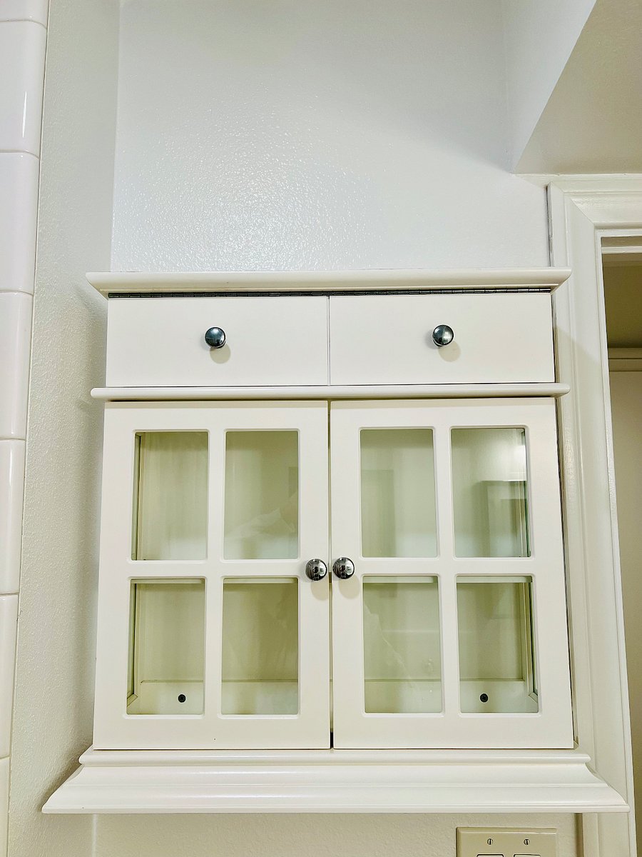 Cabinet in guest bathroom